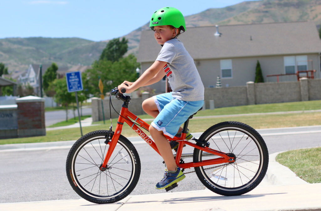 Boy riding Pello Reddi single speed bike