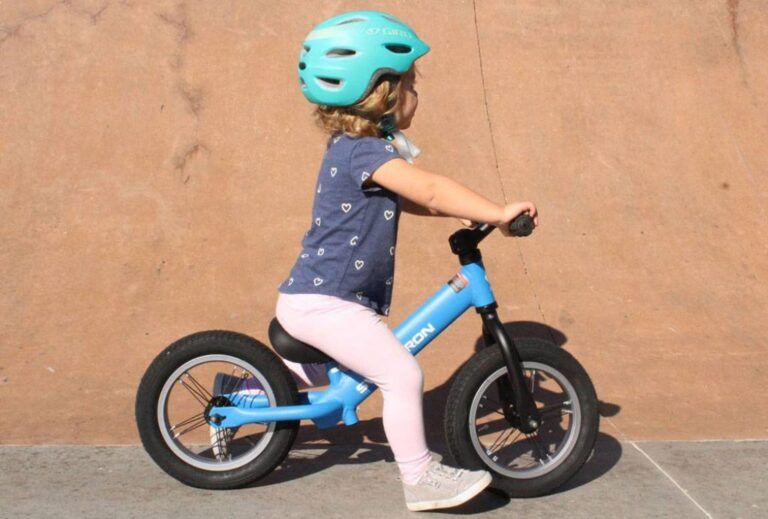 toddler riding the Swagtron k3 balance bike