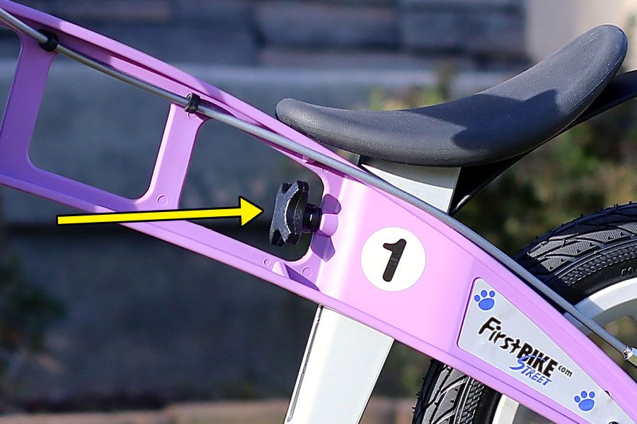 dial-adjust seat height knob on the FirstBIKE