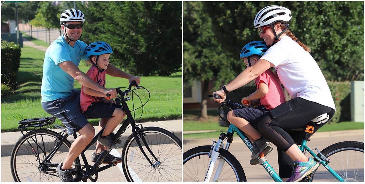 Mom and dad riding her son on the Tyke Toter. The dad has much more room than the mom.