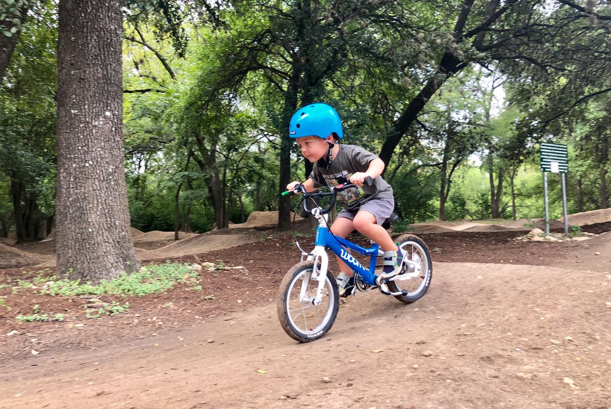 4-year-old riding woom 2 in 9th St. BMX park in Austin, TX