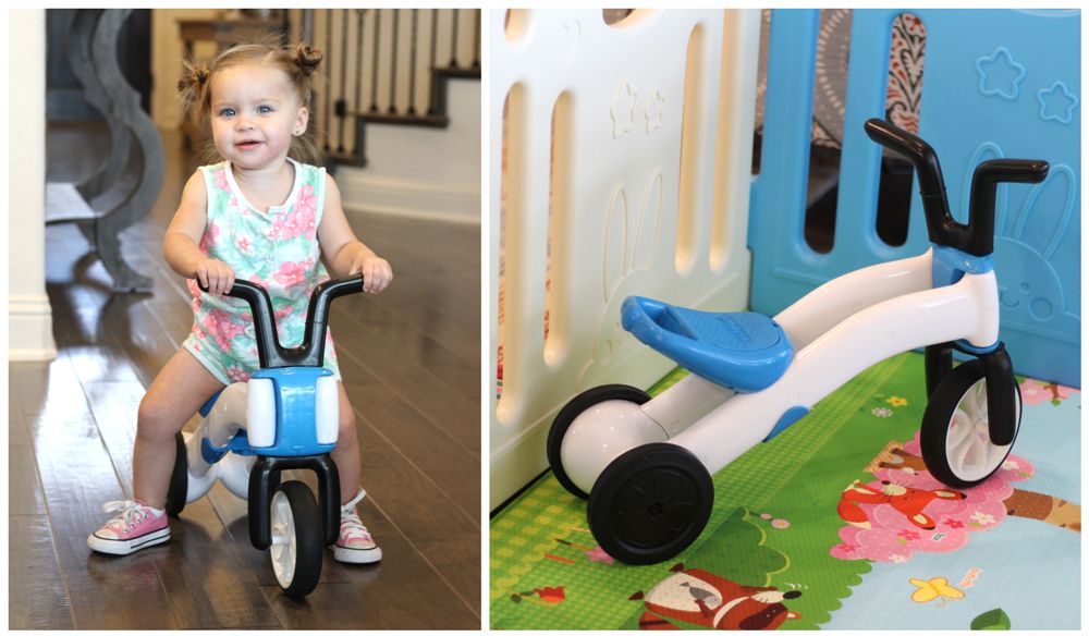 young toddler riding on a blue chillafish bunzi