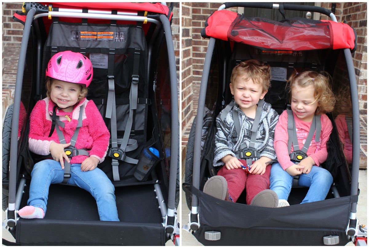 Side by side comparison of one child vs two children in the Burley Honey Bee bike trailer. Two 2 year olds is snug, but comfortable enough.
