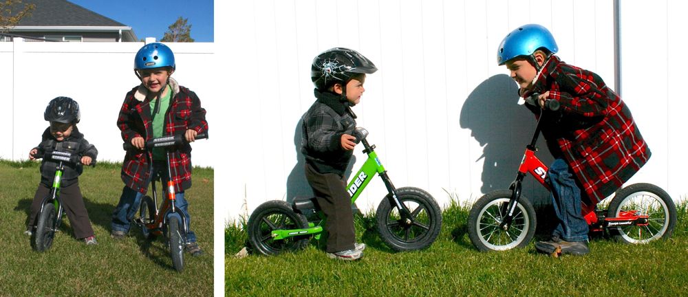 Two brothers on the same Strider balance bike. One is 18 months, the other is 5.