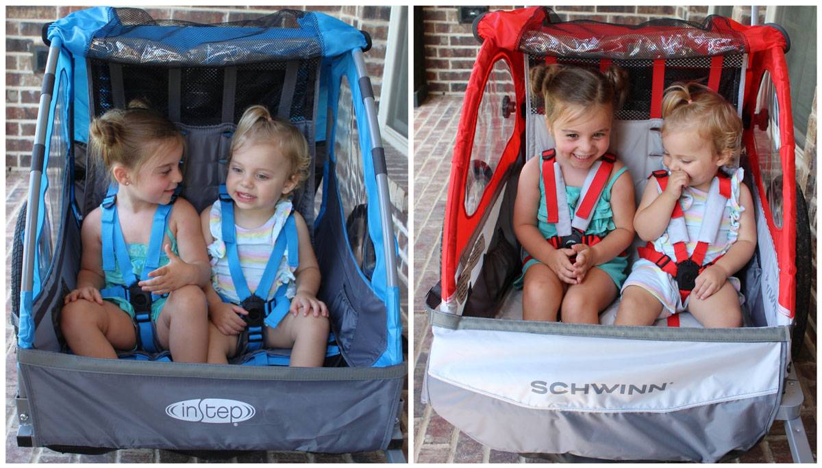 Side by side shots of 3 year old and 18 month old sitting in an InStep and the Schwinn Trailblazer trailers