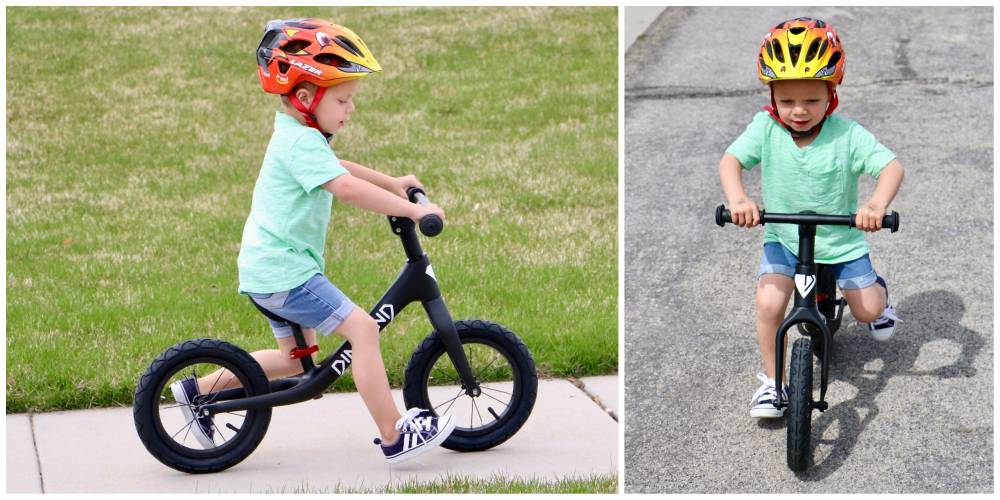3-year-old boy riding Dimond Miner balance bike down street and sidewalk