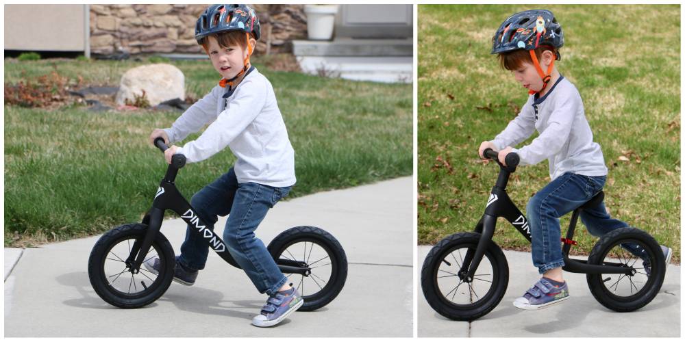 4-year-old boy riding balance bike down sidewalk