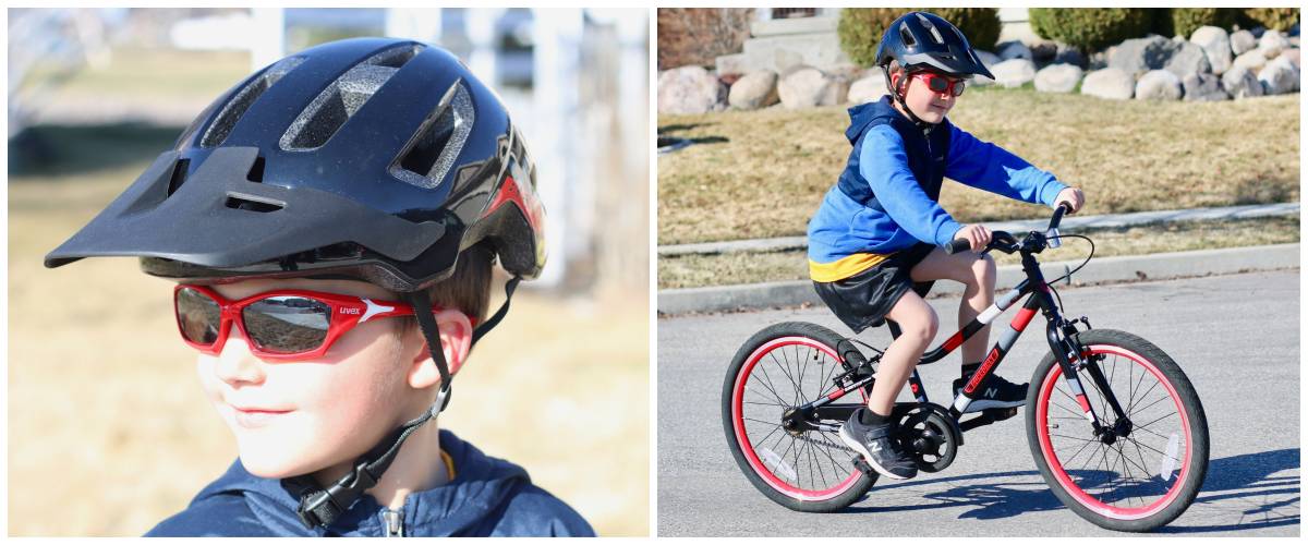 Boy wearing Bell Nomad Jr. MIPS helmet with sunglasses