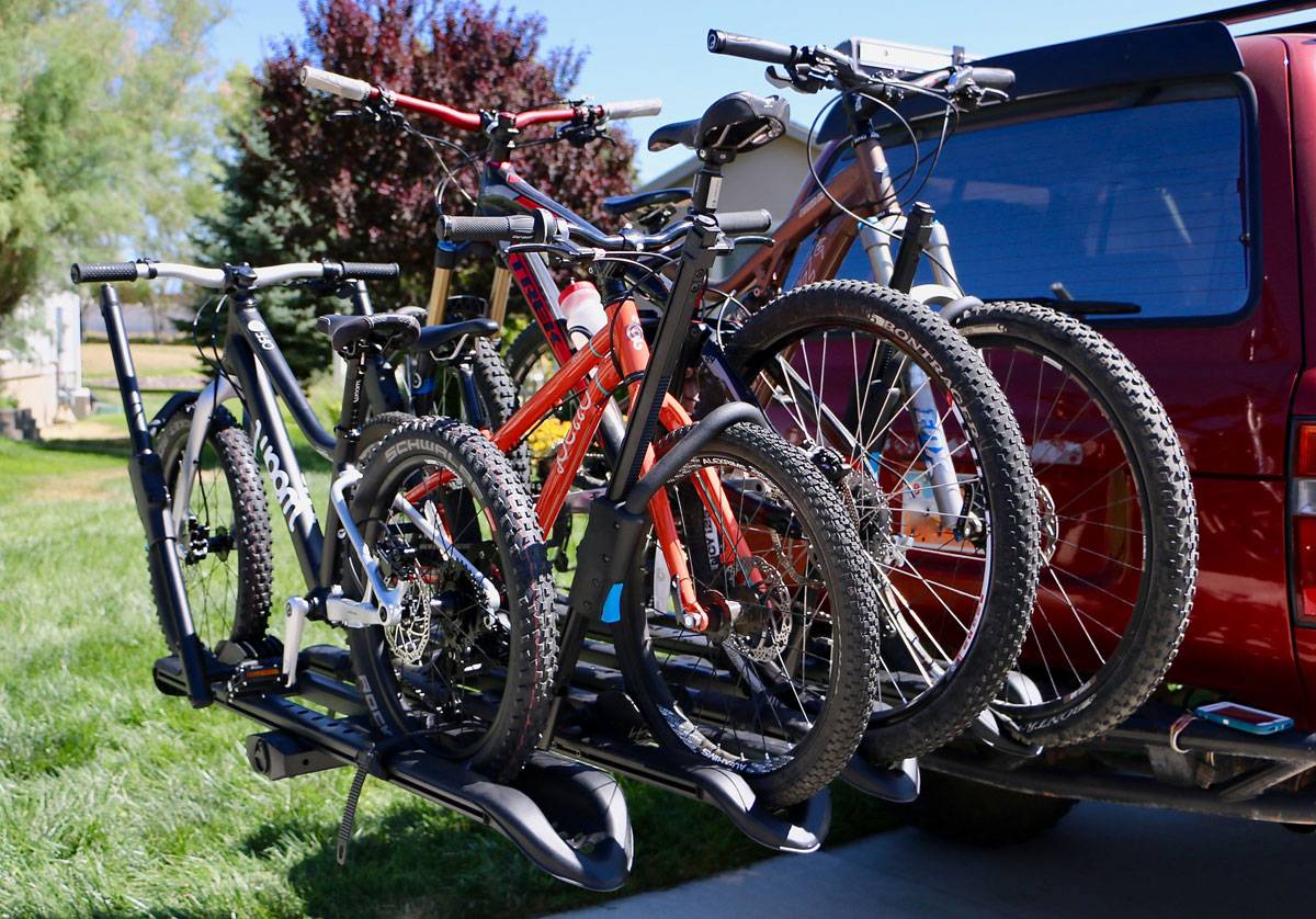 RockyMounts SplitRail LS bike car rack - loaded with 4 bikes on the back of a Landcruiser