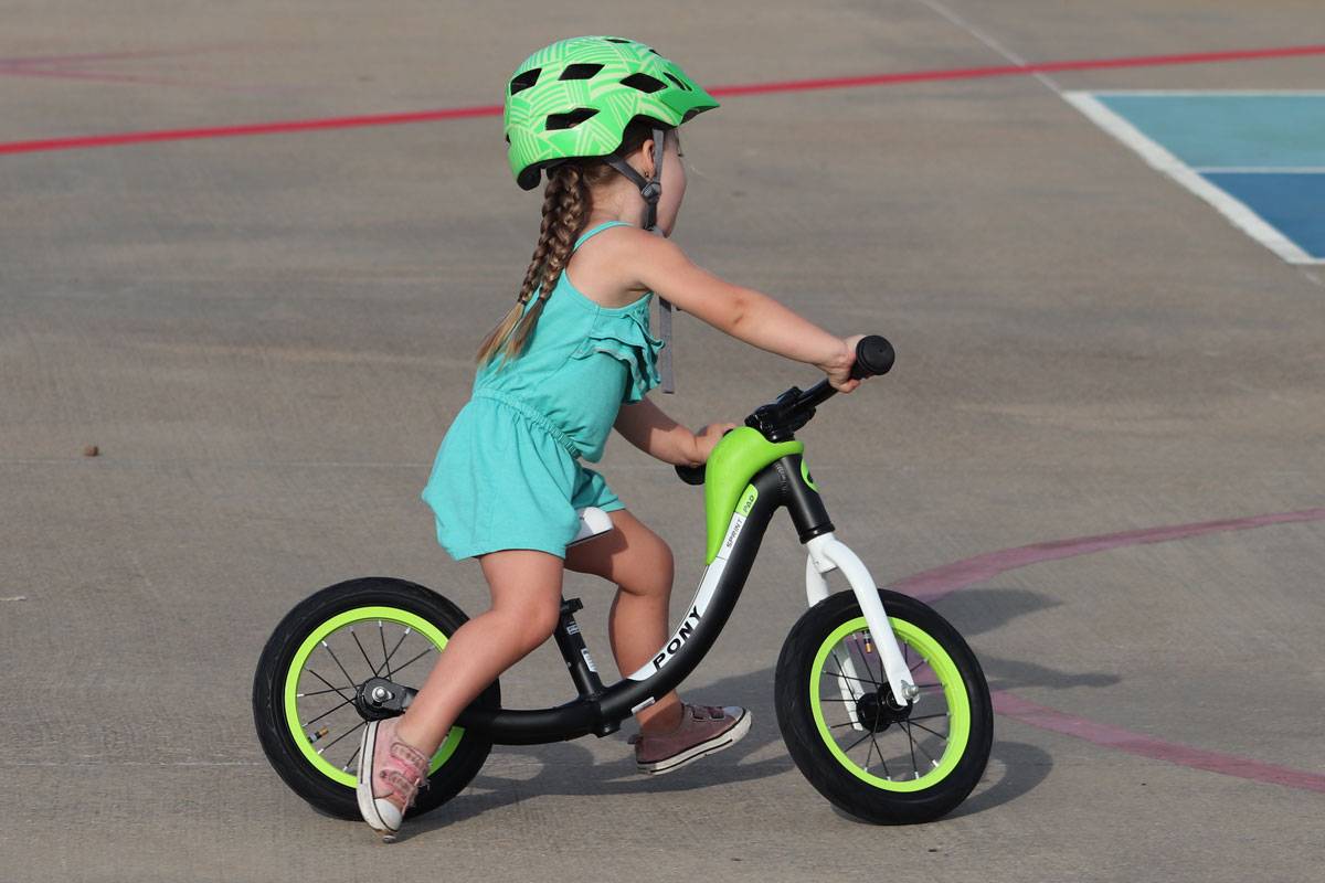 3 year old riding RoyalBaby Pony balance bike - turning easily