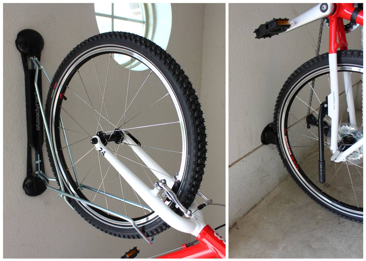 Steadyrack vertical bike storage holding a 24" tire, and the rear wheel being cradled by the wheel tray