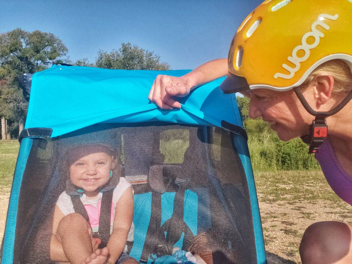 child riding in the thule coaster xt