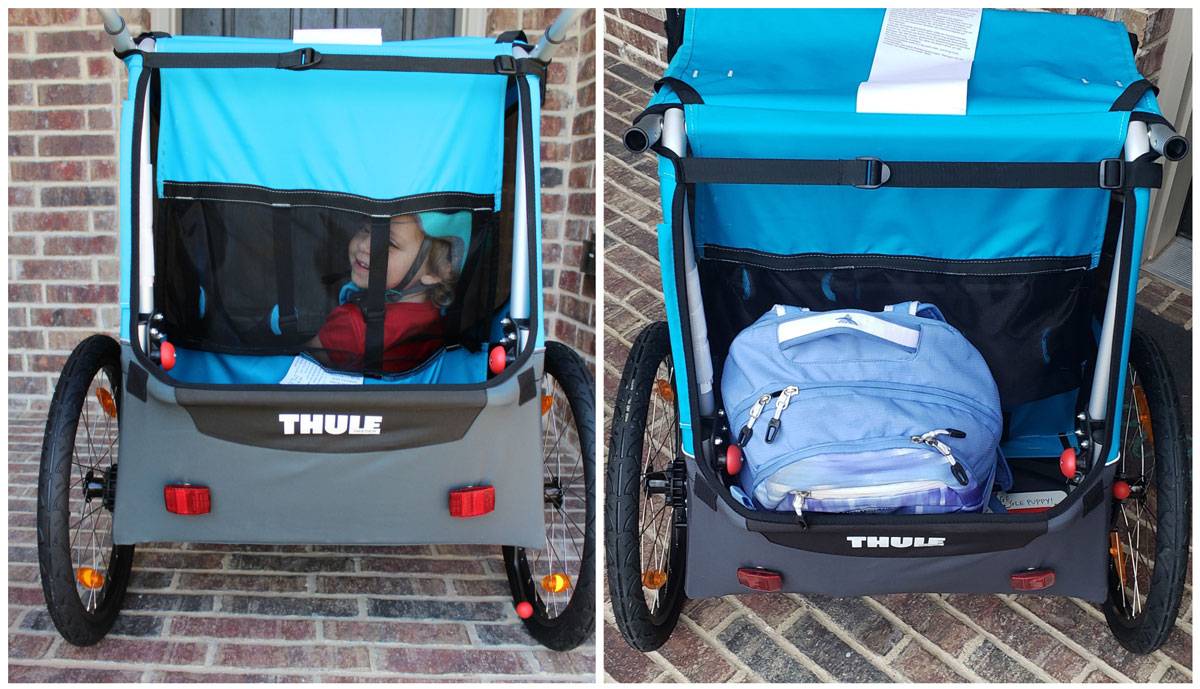 Thule Coaster XT bike trailer has great rear ventilation. Also shows backpack in the rear storage area.