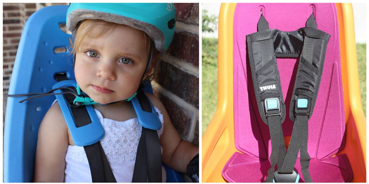 Soft foam shoulder strap pads on Thule Yepp Maxi child bike seat vs. backpack style straps on Thule RideAlong child bike seat