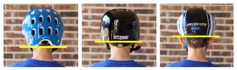 11 year old boy wearing WOOM helmet, a skater-style helmet, and a cycling-style helmet, showing coverage from the back