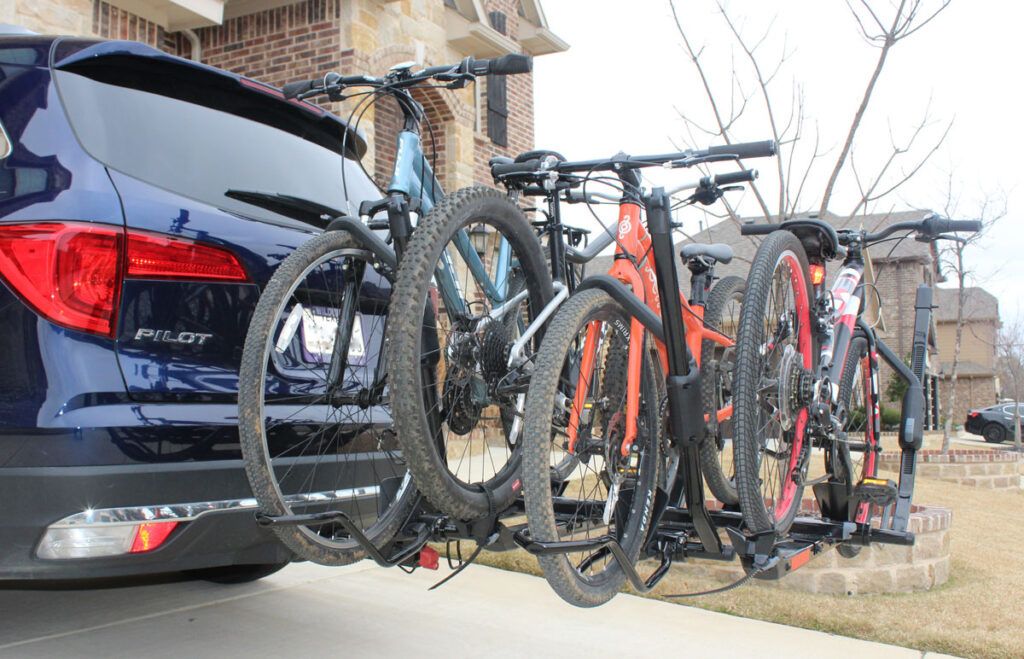 yakima HoldUp Evo bike rack loaded up with 4 bikes