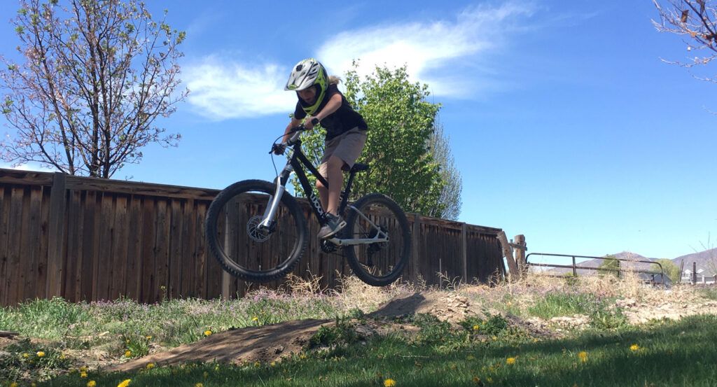 Kid shredder getting air on woom OFF Air