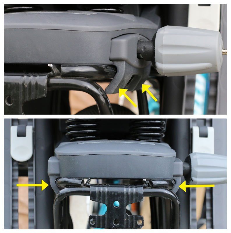 image showing the clamps that pinch a bike rack to hold the Hamax Caress child bike seat in place
