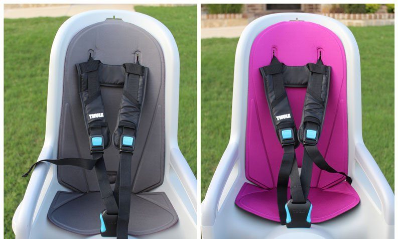 Padding on thule bike seat RideAlong is gray on one side, magenta on the other.
