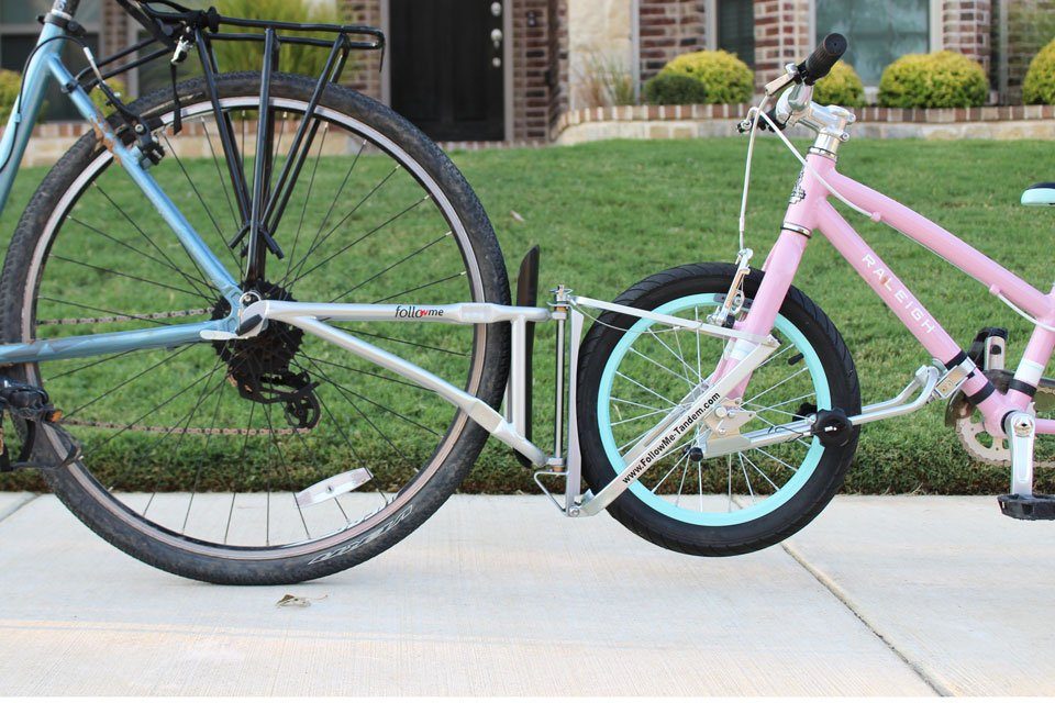 Upclose shot of FollowMe Tandem bike coupling device attaching two bikes