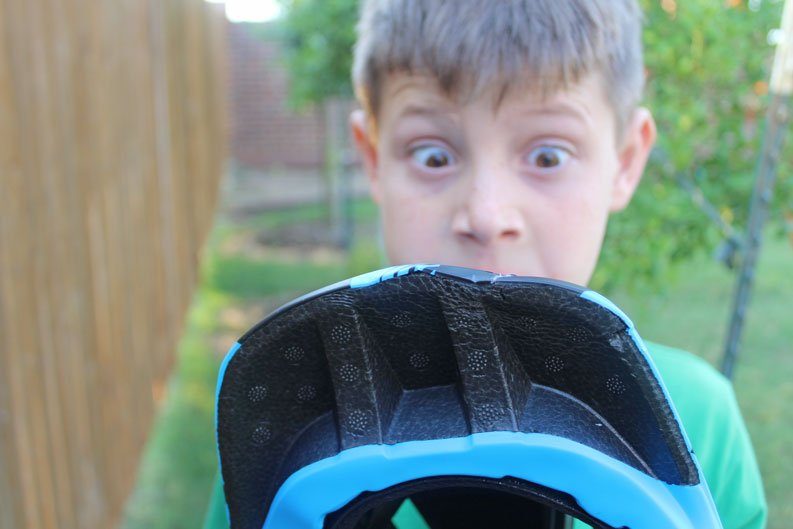 Visor of Strider Full Face helmet shows damage after a crash