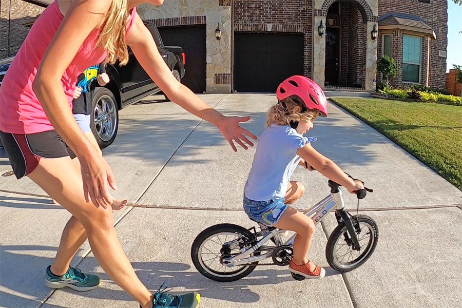 2 year old riding Prevelo Alpha One and successfully pedaling on her own for the first time
