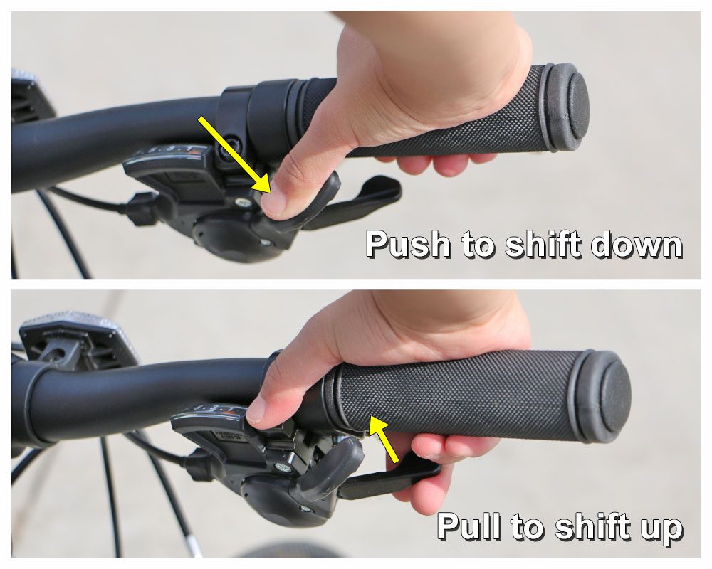 Shimano trigger shifters on Vitus kids bikes. Push with thumb to shift down. Pull with forefinger to shift up.