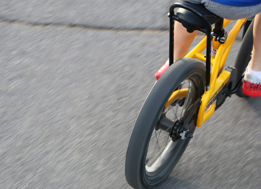 Flat treat Schwinn Sting-Ray Slik rear tire in motion.