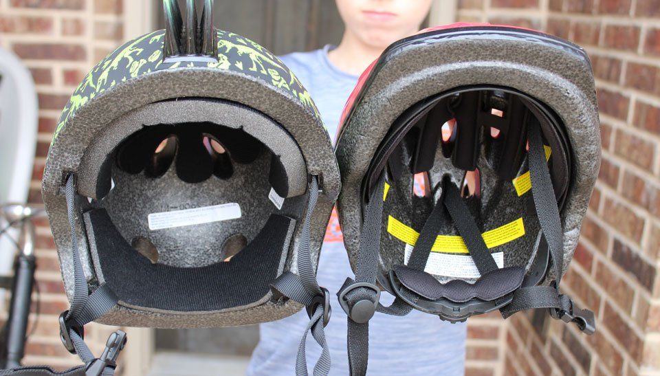 Interior of Raskullz helmet has no way to adjust the size. Compared next to helmet with dial adjust system.