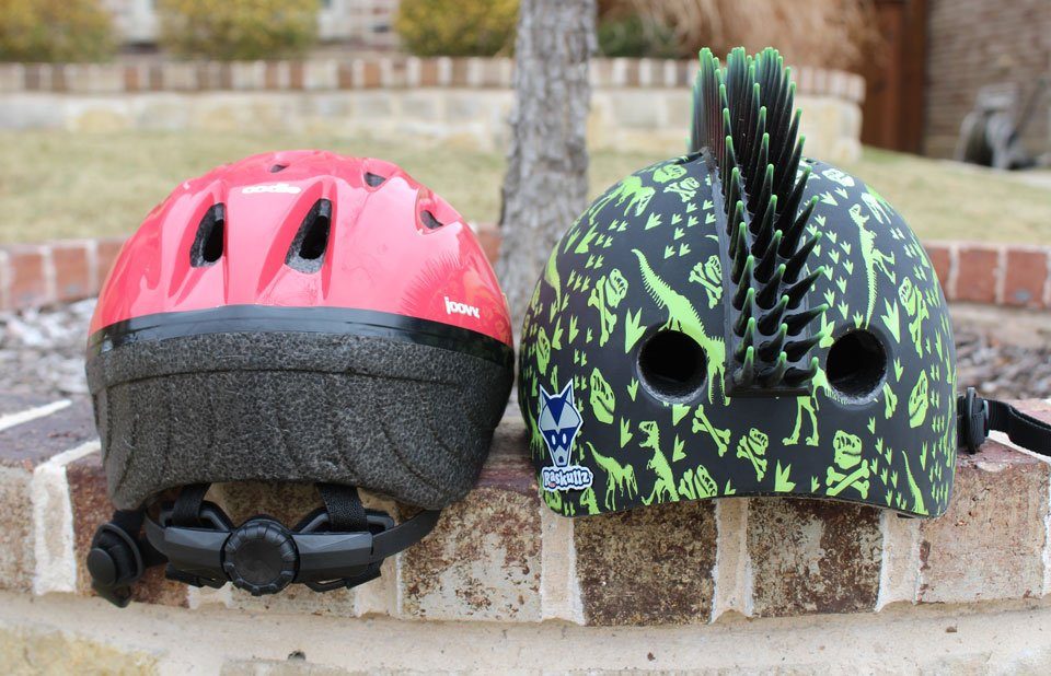 Back of Raskullz helmet showing that it doesn't have a dial adjust like the helmet next to it.