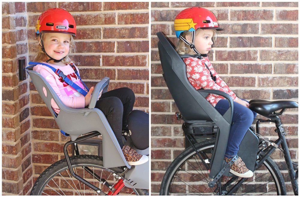 Side by side comparison of 3 year old sitting in the Bell Cocoon vs the Burley Dash. The Cocoon is much smaller.