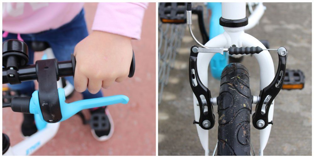 Child's hand on grip of Btwin showing brake lever. Also showing v-brake on front wheel.