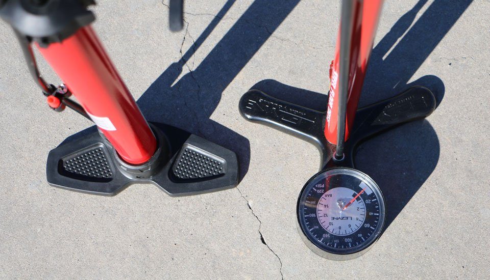 image showing the difference between the Bell Attack 350 bike pumps wobbly base and the Lezyne Steel floor pump's stable base