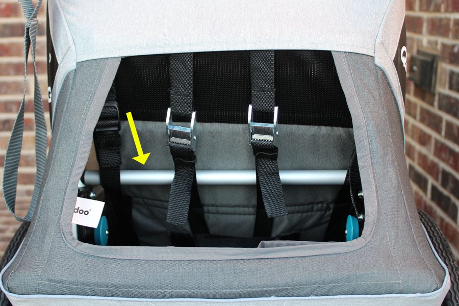 Metal bar runs across the back of the Kidgoo seat