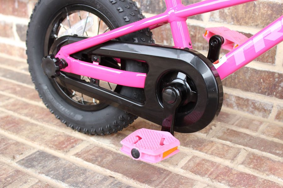 Plastic enclosed chain guard on the Precaliber 12