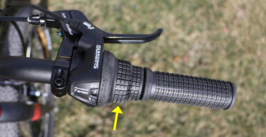 image showing the bump on the shimano tourney grip shifter on a polygon kids bike