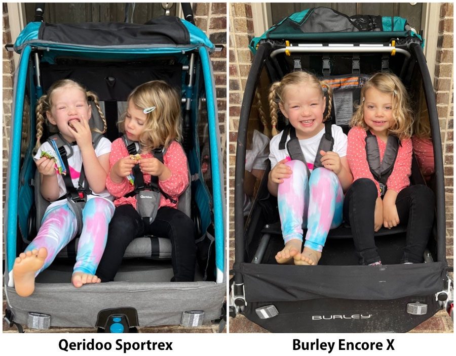 Interior space of Qeridoo Sportrex 2 child bike trailer, with a 3 year old and a 4 year old inside