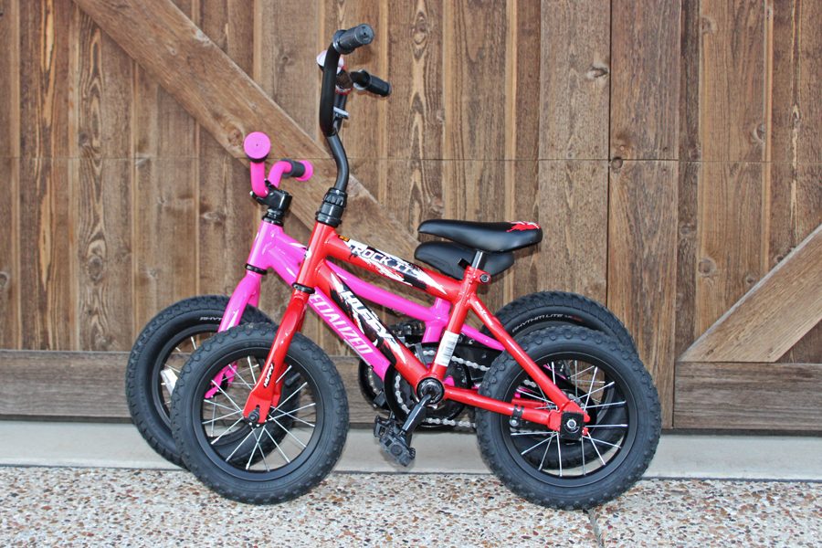 Side by side comparison of Specialized Riprock 12 and Huffy Next 12 showing the Huffy's frame is much shorter