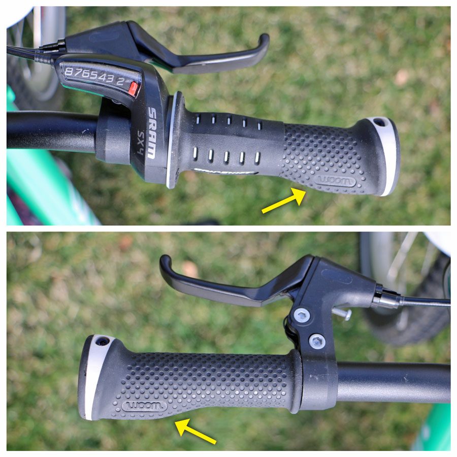 close up image of the left and right hand ergo grips on the woom 5
