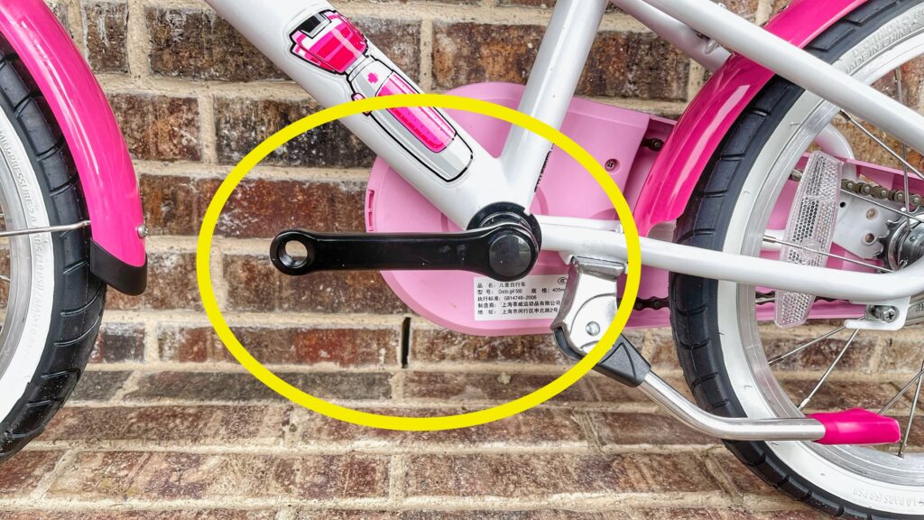 Crank are on child's bike without the pedal. It is not necessary to remove the crank arms to teach a child to ride a bike this way.