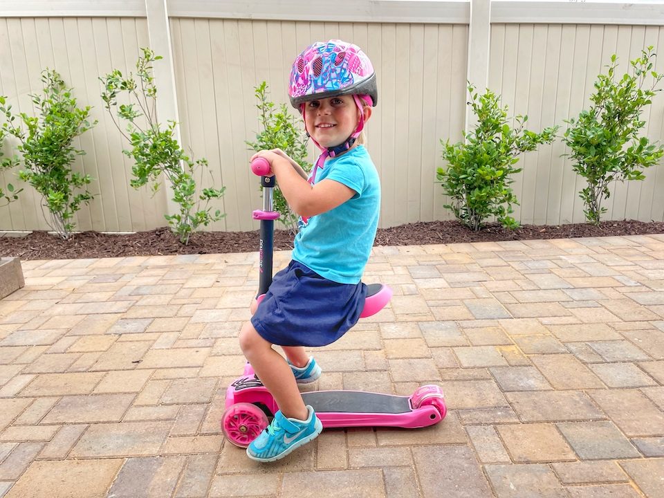 3 year old sitting on the Hurtle scooter