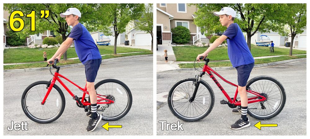 11 year old standing over the Specialized Jett 24 kids bikes