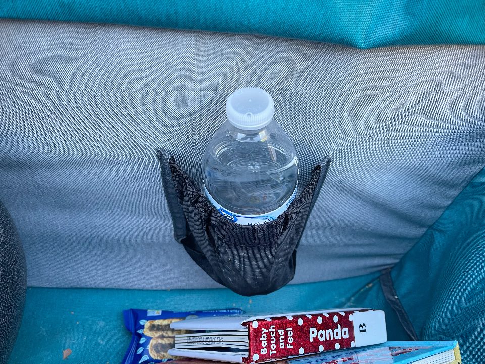 Water bottle in pocket inside rear cargo area