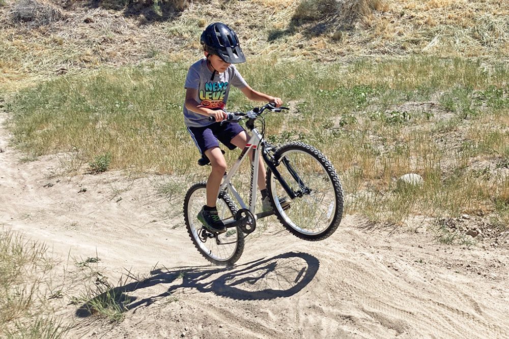 jumping on the btwin 24 kids bike