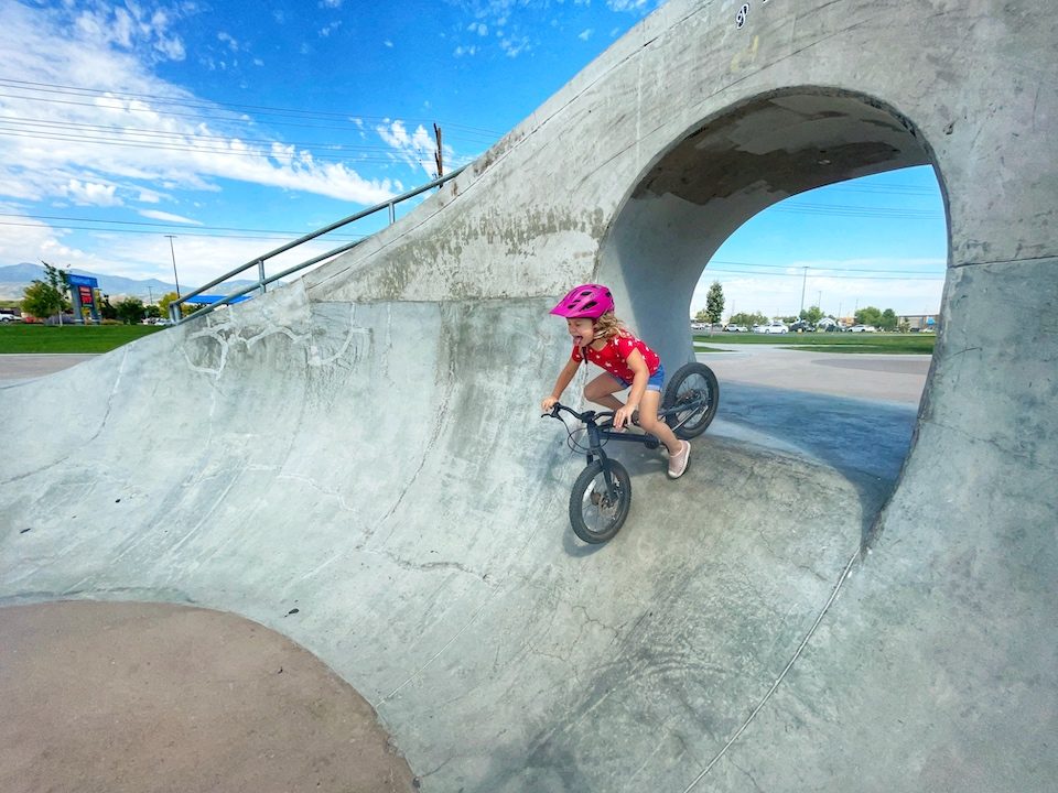 Girl dropping in on steep ramp on Prevelo Zulu Two
