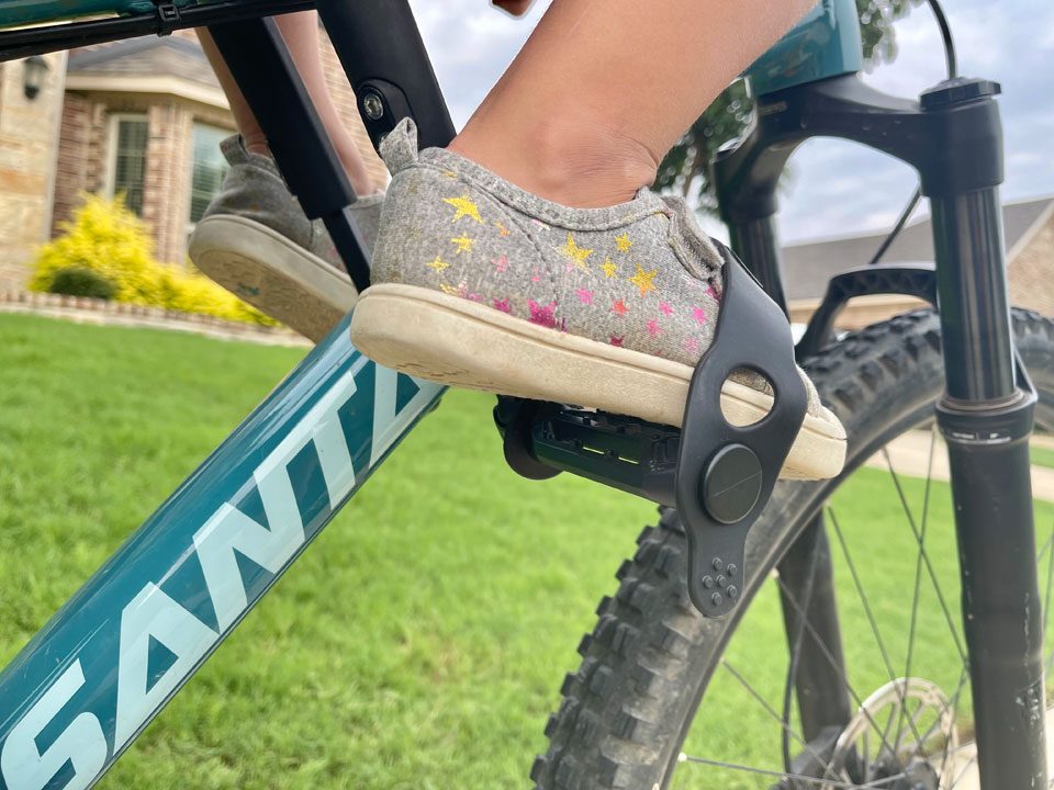 Child's foot can't sit flat on foot rests of Shotgun Pro