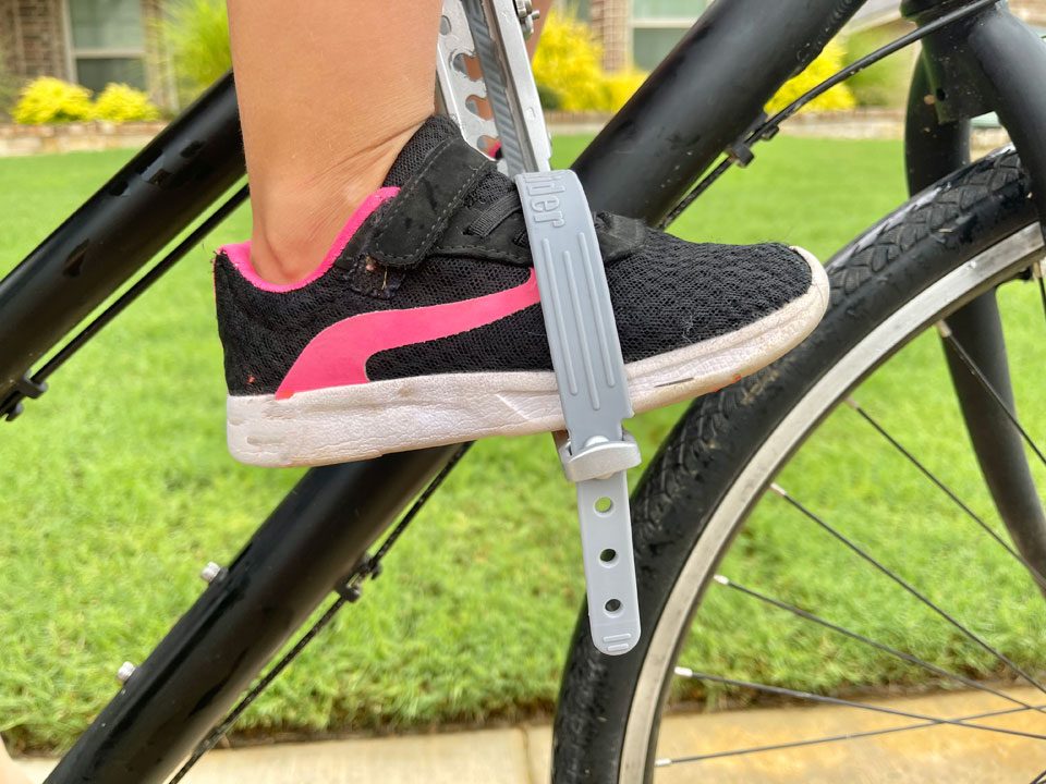 Child's foot in stirrup of UrRider