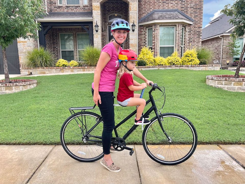 Side shot of Mom and toddler using UrRider