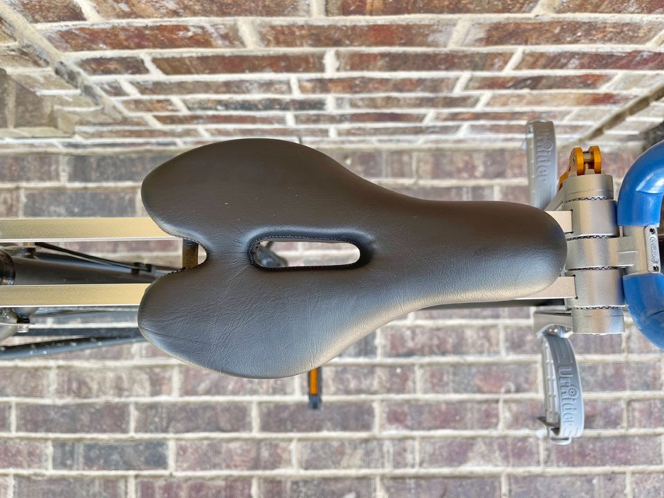 Padded saddle of UrRider child bike seat