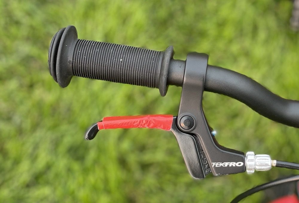 the brake lever on the Gecko covered with red tape
